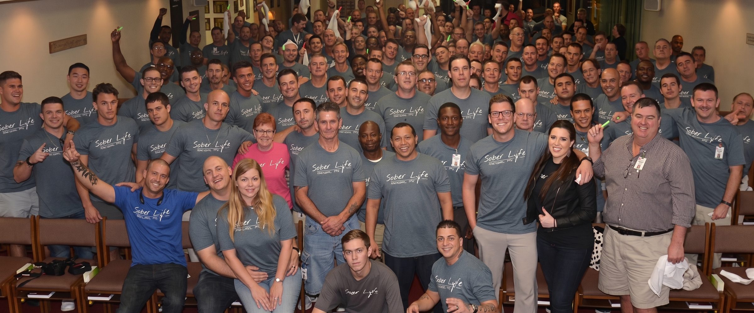 A large gathering of the Sober Lyfe community in Sober Lyfe shirts